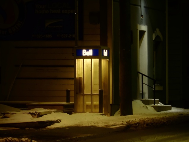 telephone booth at night