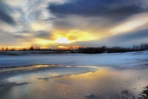Glengarry county Ontario spring sunset over flooded field