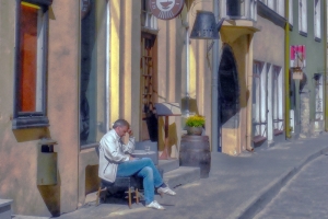 street photography man alone at sidewalk cafe